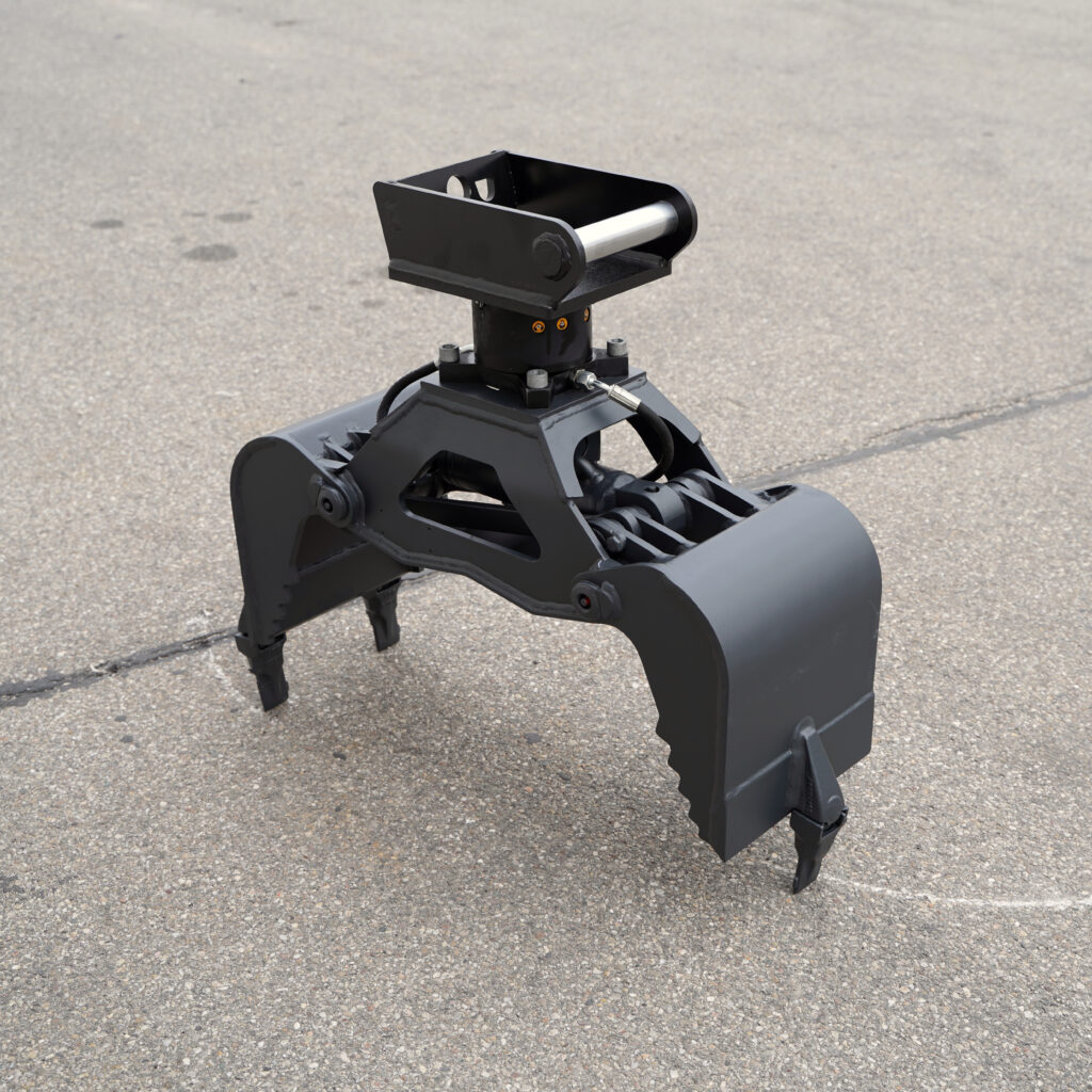 Schwarzer Greifer mit robusten Stahlarmen und sichtbarem Hydraulikanschluss steht auf Asphalt, daneben ein silberner Zylinder am oberen Aufbau.