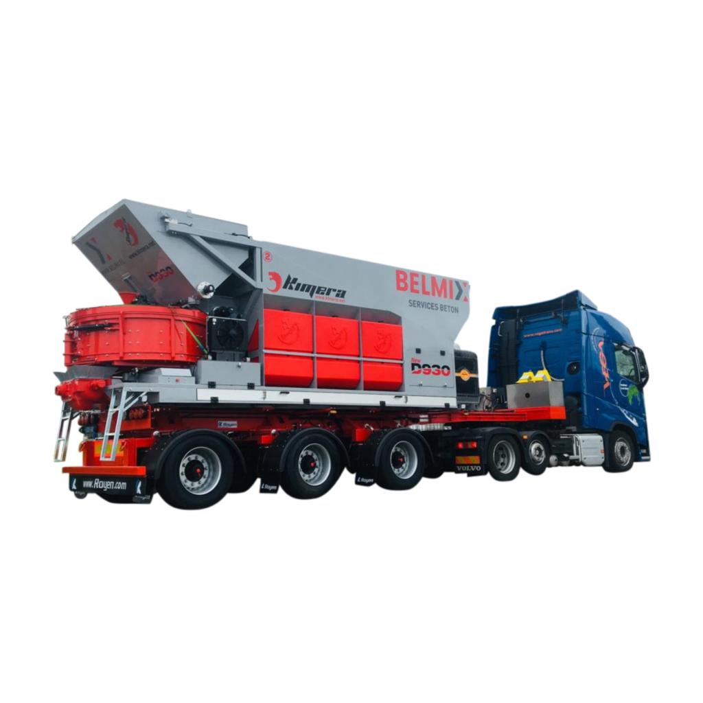 Eine mobile Kimera D930 Betonmischanlage auf einem Lkw-Fahrgestell mit grauem Aufbau, roten Mischelementen und blauer Fahrerkabine.